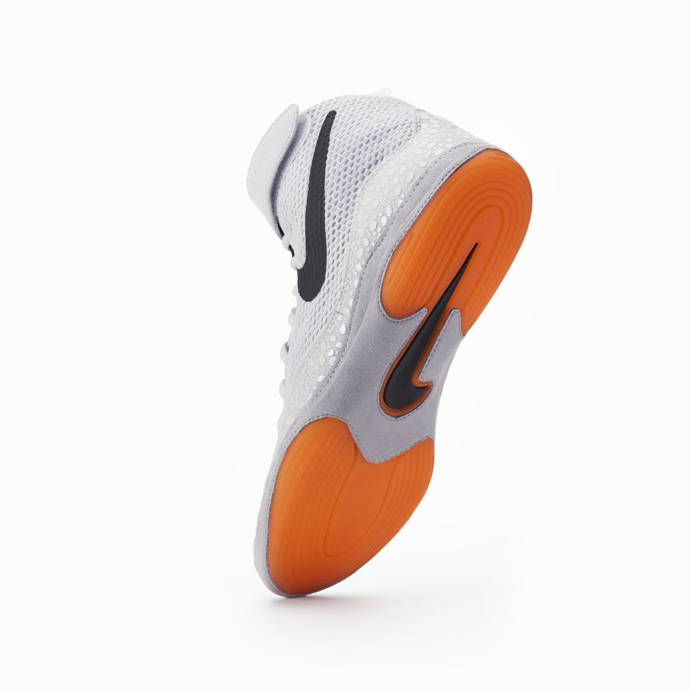 White and orange nike boots clearance